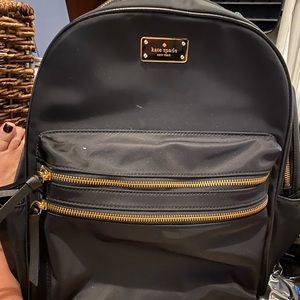 Kate Spade back pack. Only used twice to go over seas.